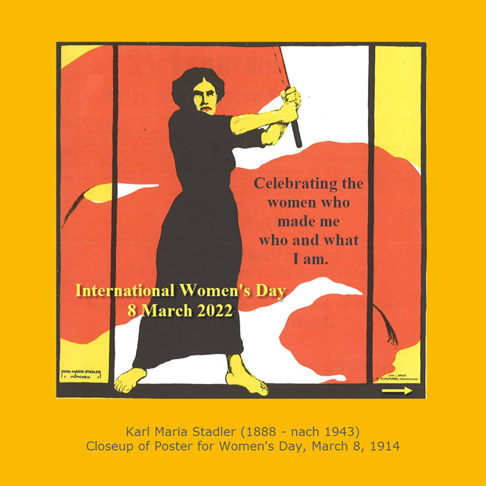 Closeup of 1914 poster for Women's Day by Karl Maria Stadler shows woman in long black dress proudly & strongly waving a large banner. 